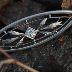 Antique Edwardian platinum Old European diamond brooch/lapel pin. By Krementz.