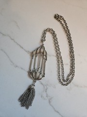 Vintage signed JJ JONETTE bird cage style tassel silver tone pendant necklace