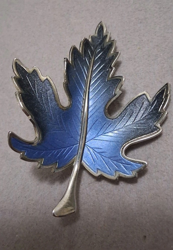 Maple leaf figural brooch, silvertone finish, blue ombre design