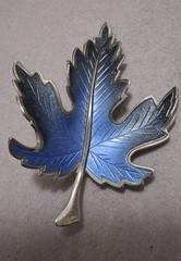 Maple leaf figural brooch, silvertone finish, blue ombre design