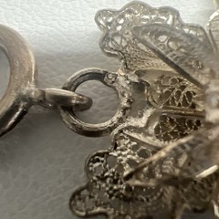 Antique Silver Bracelet featuring Finely detailed Filigree Flowers