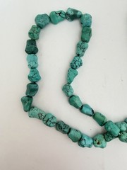 vintage necklace genuine turquoise nuggets paired with a 14K gold clasp 23” B5