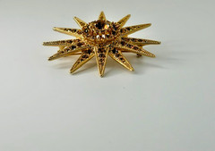 Vintage Sparkly Starburst Brooch Signed Graziano Gold Base With Topaz Rhinestone