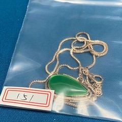 Oval Emerald-Toned Pendant Necklace – Gold-Toned Halo Setting