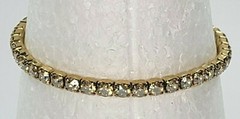 Prong Set Clear Rhinestones Gold Tone Stretch Tennis Bracelet 7.-8.5 In 4mm Wide