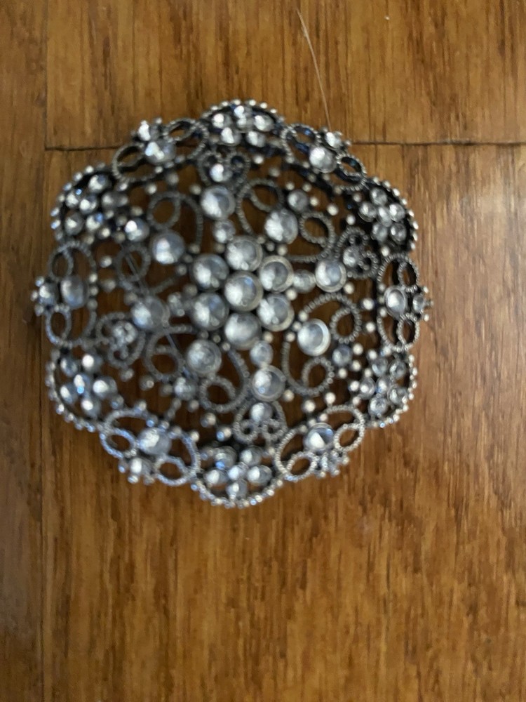 Round Silver Tone Base Metal Brooch With Clear Rhinestones 1 3/4 Inches