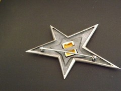 1989, Sterling silver and 18K yellow gold large star pin by Pedro Boregaard, NY