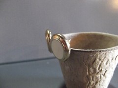 1 Pair Old .75″in Roundish Gold Tone with Tan Middle Studs