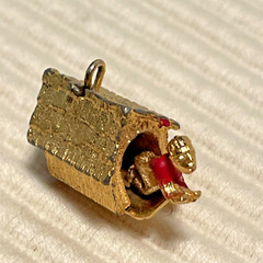 1960’s Man in Doghouse Goldtone Bracelet Charm Mechanical Signed C S Red Paint