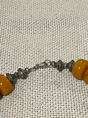 Berber necklace from Morocco with amber beads and antique Tuareg silver ball