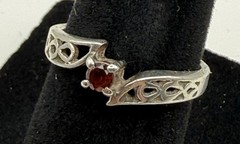 Vintage Ladies Sterling Silver Ring with a Red Garnet and Celtic Knot Design