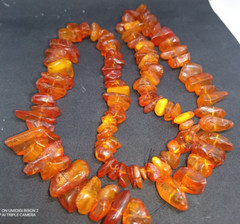 Necklace made of natural beautiful cognac amber weight 74 grams.