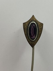 Antique Victorian gold tone stick pin purple glass faceted stone scroll design