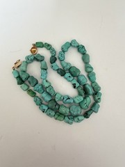 vintage necklace genuine turquoise nuggets paired with a 14K gold clasp 23” B5