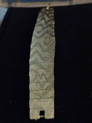 Les Bernard Inc Bracelet Wide Articulated Link Bracelet Textured Wave Pattern