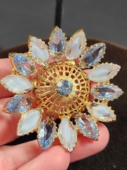 Vintage icy blue and givre navette gold tone filigree 3D flower brooch
