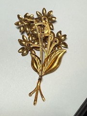 Vintage flower brooch gold tone C Clasp stamped brass red stones prong set