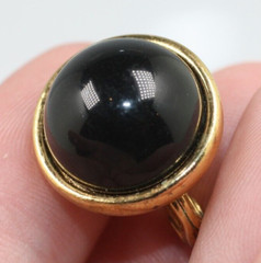 Vintage gold tone black cabochon small push back clip on Monet earrings