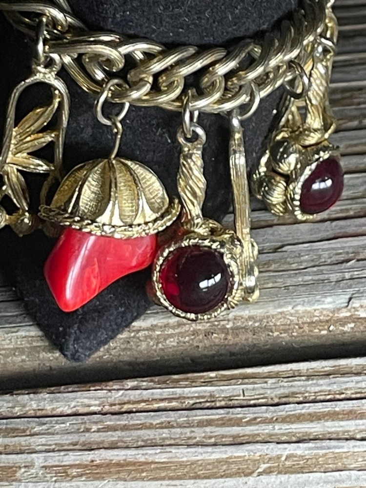 1950’s Gold tone Red Glass Gripoix charm bracelet 7.5 charms measure 1″ x 0.66″