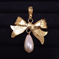 Dauplaise Gold Tone Bow Pendant with Faux Pearl Dangle (No Chain)