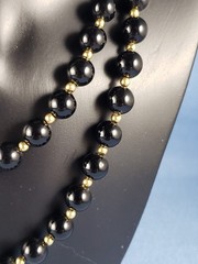 Vintage black onyx 14K gold beads necklace 30″ hand knotted