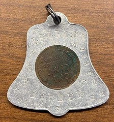 VINTAGE BELL SHAPED “GOOD LUCK/NEVER GO BROKE” PENDANT W/1930 PENNY