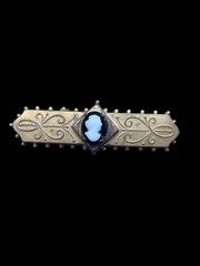 Victorian Gold filled bar pin with cameo on top of black onyx centerpiece