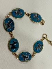 Vintage gold tone glass reversed painted Essex crystal dog bracelet 8 1/4”