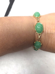 Vtg gold tone green lucite carved Scarab Bracelet