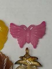 Lot Of 4 Vintage-style translucent plastic leaf and butterfly pendants/jewelry