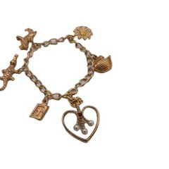 Vintage Gold Tone Multi Charm Bracelet Heart Cross Book Alligator Ark Flower 6