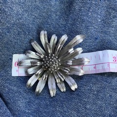 TRIFARI Brooch Pin Flower Floral Burst signed – silvertone relief 2.25″ diameter