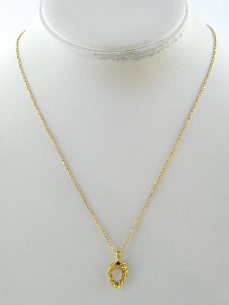 Vintage Goldtone Metal Ruby and Opaline Glass Pendant Necklace 3g 17.75 Inches