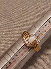 Uncas gold plated opal and rhinestone accent ring size 11.75