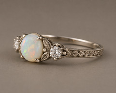 Handcrafted White Ethiopian Opal Ring with Moissanite Accents & Vintage Leaf