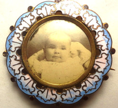 c1890 MOURNING PIN – BABY BOY CELLULOID PHOTO – CHAMPLEVE ENAMELED FRAME