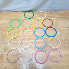 Vintage Tube of 18 Multicolor Plastic Lucite Stacking Buncha Bangle Bracelets