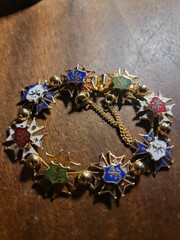 Vintage unbranded gold-tone enamel Maltese cross heraldic bracelet.