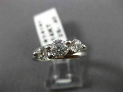 ESTATE .91CT DIAMOND 14KT WHITE GOLD 3D PAST PRESENT FUTURE TENSION RING #14161