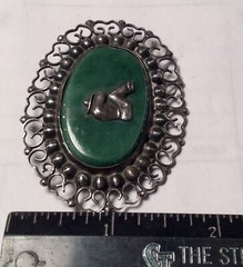 A vintage sterling silver made in Mexico brooch. Mexico jade with man siesta .