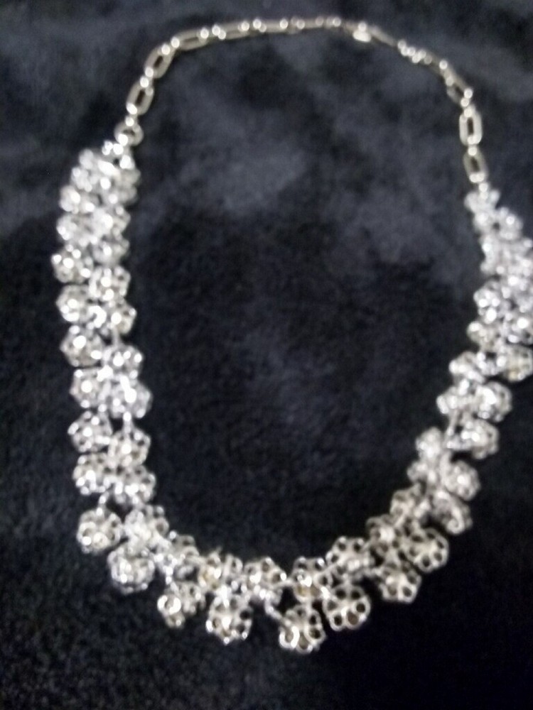 Beautiful vintage rhinestone type of choker necklace. No brand markings