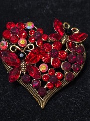 Gold tone Red heart brooch.