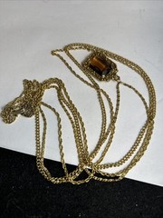 32 in.³ triple strand Goldette amber colored faceted glass necklace