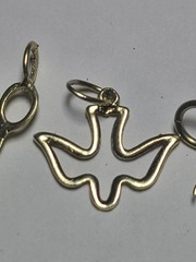 5.50 14K SOLID YELLOW GOLD, 6 14K Charms and one heavy charm holder
