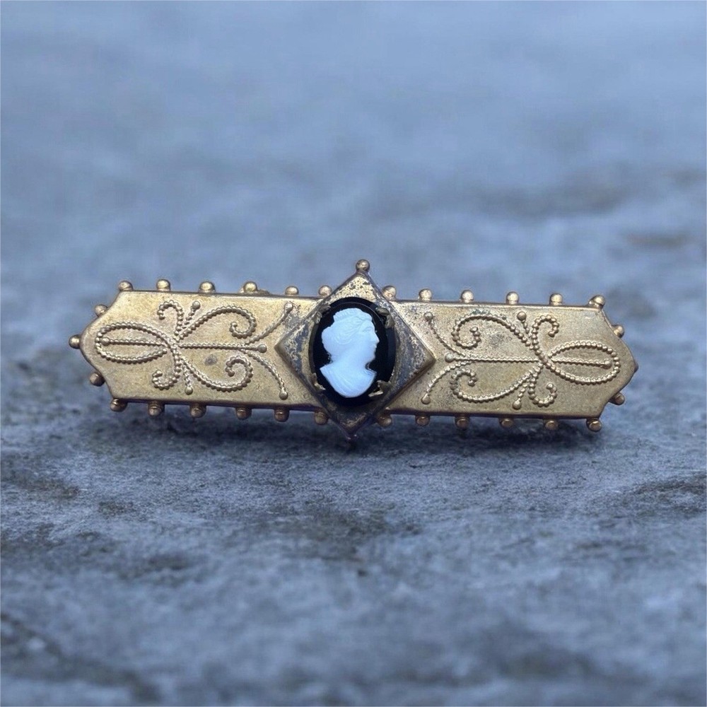 Victorian Gold filled bar pin with cameo on top of black onyx centerpiece