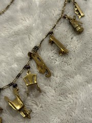 Pididdly Brass Necklace tiny Purple Glass Beads and 15 Mechanical Charms Vintage