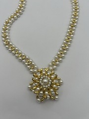 Vintage Necklace Of Gold-tone Beads With Faux Pearls And A Snowflake Pendant