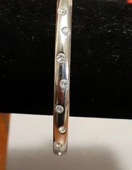Crystal polka dot bangle bracelet Silvertone flush set stones eternity band