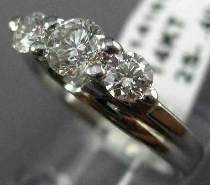 ESTATE .91CT DIAMOND 14KT WHITE GOLD 3D PAST PRESENT FUTURE TENSION RING #14161