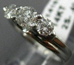 ESTATE .91CT DIAMOND 14KT WHITE GOLD 3D PAST PRESENT FUTURE TENSION RING #14161